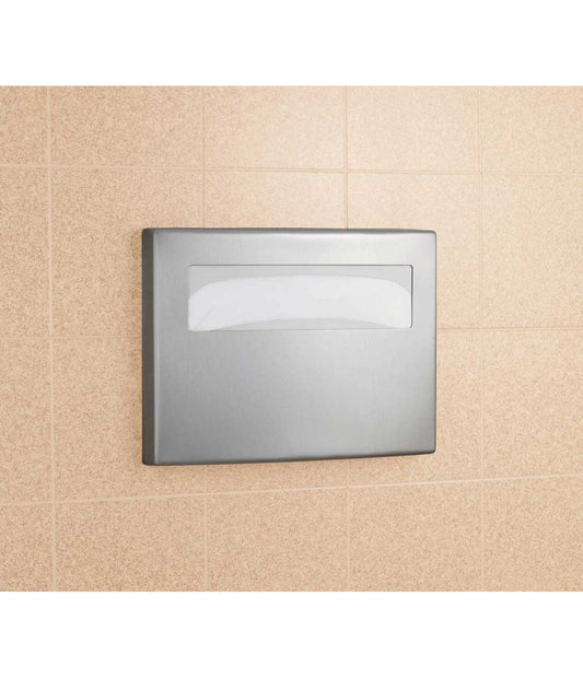 The Bobrick B-4221 is a surface-mounted toilet seat cover dispenser in stainless steel with a satin finish.